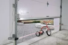 Garage door closing on a bicycle